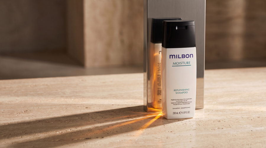 Milbon Moisture Replenishing Shampoo dalam komposisi editorial batu dan metal